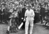 August 1938:  Spectators clapping Australian cricketer Sir Don Bradman (1908 - 2001) as he comes out during the 4th Test Match at Headingley, Leeds. Sir Donald Bradman was the first cricketer to be knighted in 1949 for his services to cricket.  (Photo by Fox Photos/Getty Images)