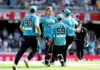 BRISBANE, AUSTRALIA - JANUARY 22: Spencer Johnson of the Heat celebrates victory with his team mates after the Men's Big Bash League match between the Brisbane Heat and the Melbourne Stars at The Gabba, on January 22, 2023, in Brisbane, Australia. (Photo by Bradley Kanaris/Getty Images)