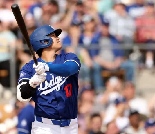GLENDALE, ARIZONA - FEBRUARY 27: Shohei Ohtani #17 of the Los Angeles Dodgers hits a two-run home run in the fifth inning inning during a game against the Chicago White Sox at Camelback Ranch on February 27, 2024 in Glendale, Arizona. (Photo by Christian Petersen/Getty Images)