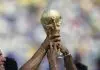 Brazil footballers celebrate with the FIFA World Cup trophy following the World Cup final between Brazil and Italy, at the Rose Bowl in Pasadena, California, 17th July 1994. Brazil won the match on penalties after the game ended 0-0 after extra time. (Photo by Henri Szwarc/Bongarts/Getty Images)