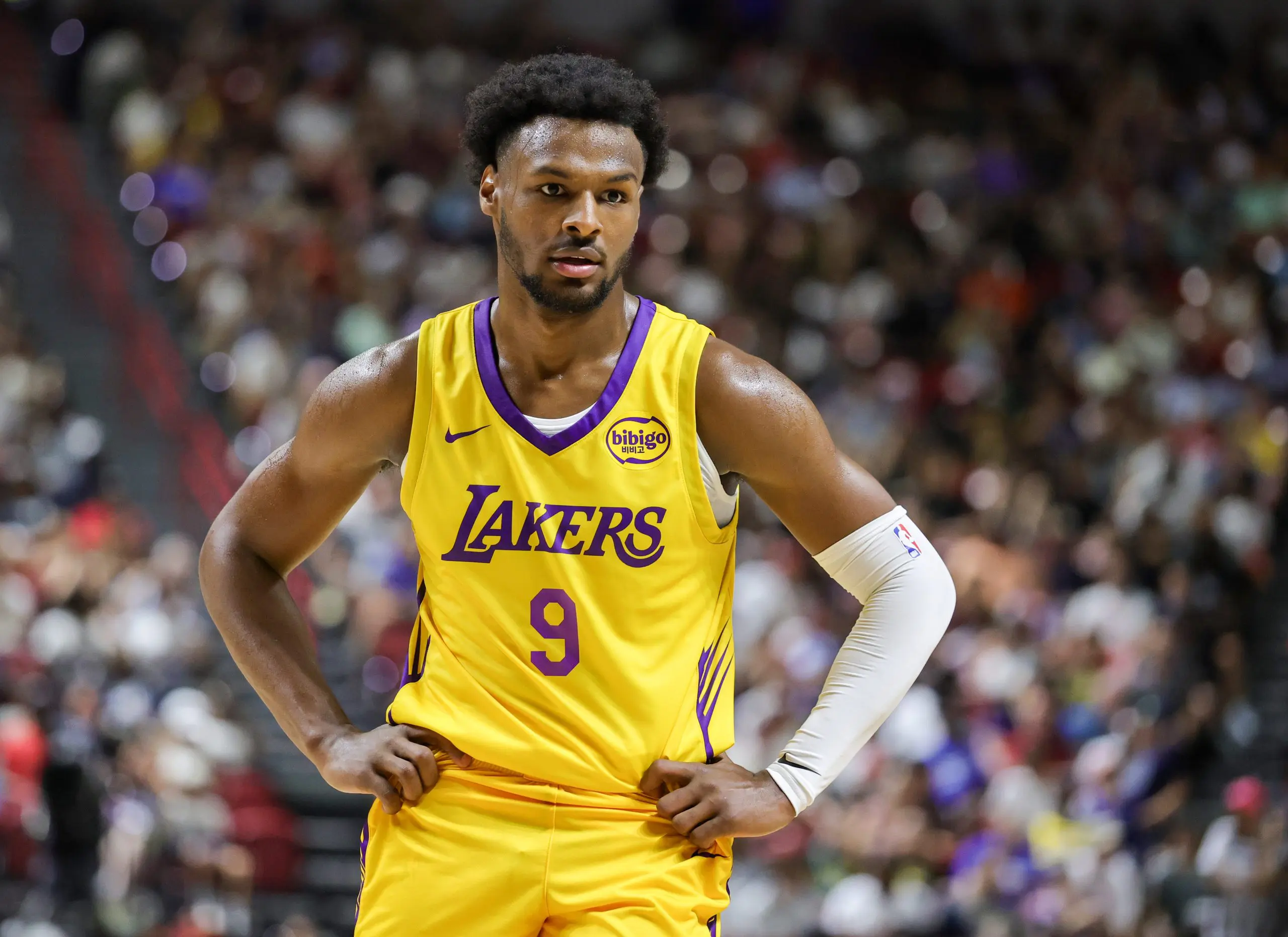 LAS VEGAS, NEVADA - JULY 10: Bronny James #9 of the Los Angeles Lakers stands on the court during a break in the second half of a 2025 NBA Summer League game against the Dallas Mavericks at the Thomas & Mack Center on July 10, 2025 in Las Vegas, Nevada. NOTE TO USER: User expressly acknowledges and agrees that, by downloading and or using this photograph, User is consenting to the terms and conditions of the Getty Images License Agreement. (Photo by Ethan Miller/Getty Images)
