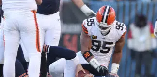 CHICAGO, ILLINOIS - DECEMBER 14: Myles Garrett #95 of the Cleveland Browns sacks Caleb Williams #18 of the Chicago Bears at Soldier Field on December 14, 2025 in Chicago, Illinois. (Photo by Michael Reaves/Getty Images)