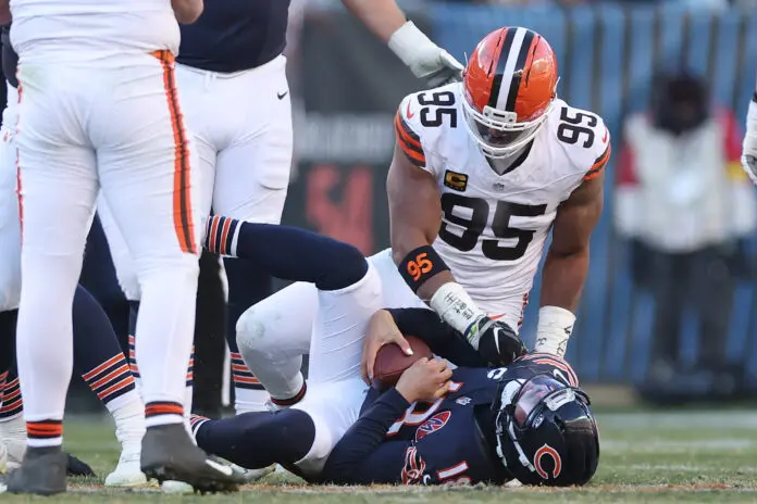CHICAGO, ILLINOIS - DECEMBER 14: Myles Garrett #95 of the Cleveland Browns sacks Caleb Williams #18 of the Chicago Bears at Soldier Field on December 14, 2025 in Chicago, Illinois. (Photo by Michael Reaves/Getty Images)