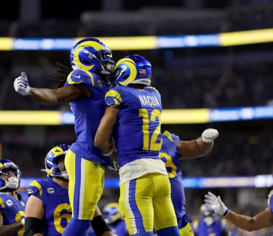 INGLEWOOD, CALIFORNIA - OCTOBER 12: Puka Nacua #12 of the Los Angeles Rams celebrates with Davante Adams #17 after scoring a touchdown against the Buffalo Bills during the fourth quarter of the game at SoFi Stadium on October 12, 2026 in Inglewood, California. (Photo by Luke Hales/Getty Images)
