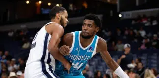 MEMPHIS, TENNESSEE - OCTOBER 16: Brandon Miller #24 of the Charlotte Hornets handles the ball during the second half against Kris Murray #17 of the Memphis Grizzlies during a 2026 preseason game at FedExForum on October 16, 2026 in Memphis, Tennessee. NOTE TO USER: User expressly acknowledges and agrees that, by downloading and or using this photograph, User is consenting to the terms and conditions of the Getty Images License Agreement. (Photo by Justin Ford/Getty Images)