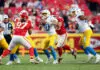 KANSAS CITY, MISSOURI - OCTOBER 18: George Karlaftis #56 of the Kansas City Chiefs sacks Justin Herbert #10 of the Los Angeles Chargers in the fourth quarter of a game at Arrowhead Stadium on October 18, 2026 in Kansas City, Missouri. (Photo by Jamie Squire/Getty Images)