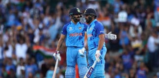 SYDNEY, AUSTRALIA - OCTOBER 27: Virat Kohli of India talks to Rohit Sharma of India during the ICC Men's T20 World Cup match between India and Netherlands at Sydney Cricket Ground on October 27, 2022 in Sydney, Australia. (Photo by Cameron Spencer/Getty Images)