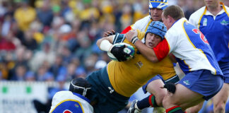 Nathan Sharpe of the Wallabies is tackled