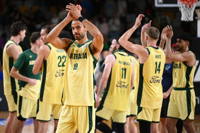 GOLD COAST, AUSTRALIA - JULY 31: Xavier Cooks of the Boomers acknowledges fans after the match between Australian Boomers and University Of Colorado Buffaloes at Gold Coast Sports and Leisure Centre on July 31, 2025 in Gold Coast, Australia. (Photo by Matt Roberts/Getty Images)