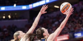 INDIANAPOLIS, INDIANA - JULY 13: Caitlin Clark #22 of the Indiana Fever shoots the ball against Paige Bueckers #5 of the Dallas Wings during the first half at Gainbridge Fieldhouse on July 13, 2025 in Indianapolis, Indiana. NOTE TO USER: User expressly acknowledges and agrees that, by downloading and or using this photograph, User is consenting to the terms and conditions of the Getty Images License Agreement. (Photo by Michael Hickey/Getty Images)