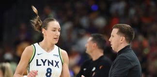 PHOENIX, ARIZONA - SEPTEMBER 28: Acting head coach Eric Thibault of the Minnesota Lynx high fives Alanna Smith #8 during the first half of Game Four of the 2025 WNBA Playoffs semifinals against the Phoenix Mercury at PHX Arena on September 28, 2025 in Phoenix, Arizona. NOTE TO USER: User expressly acknowledges and agrees that, by downloading and or using this photograph, User is consenting to the terms and conditions of the Getty Images License Agreement. (Photo by Christian Petersen/Getty Images)