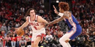 CHICAGO, ILLINOIS - NOVEMBER 04: Josh Giddey #3 of the Chicago Bulls drives to the basket against Kelly Oubre Jr. #9 of the Philadelphia 76ers during the second half at the United Center on November 04, 2025 in Chicago, Illinois. NOTE TO USER: User expressly acknowledges and agrees that, by downloading and or using this photograph, User is consenting to the terms and conditions of the Getty Images License Agreement.  (Photo by Michael Reaves/Getty Images)